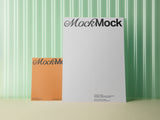 Poster/letterhead and square card mockup on a green corrugated plastic background.