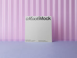Square card mockup on a pink corrugated plastic background