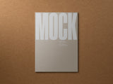 Poster/letterhead mockup on a cardboard background top view.