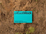 Business card mockup on an eco/ground background top view.