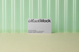 Business card mockup on a corrugated plastic background top view.