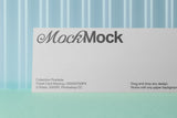 Ticket/invitation card mockup on a corrugated plastic background top view.