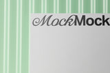 Poster/letterhead mockup on a corrugated plastic background top view.
