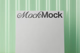 Square card mockup on a corrugated plastic background top view.