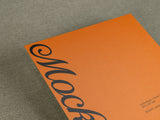 Poster/letterhead mockup on a canvas background top view.