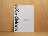 Poster/letterhead mockup on a wooden background